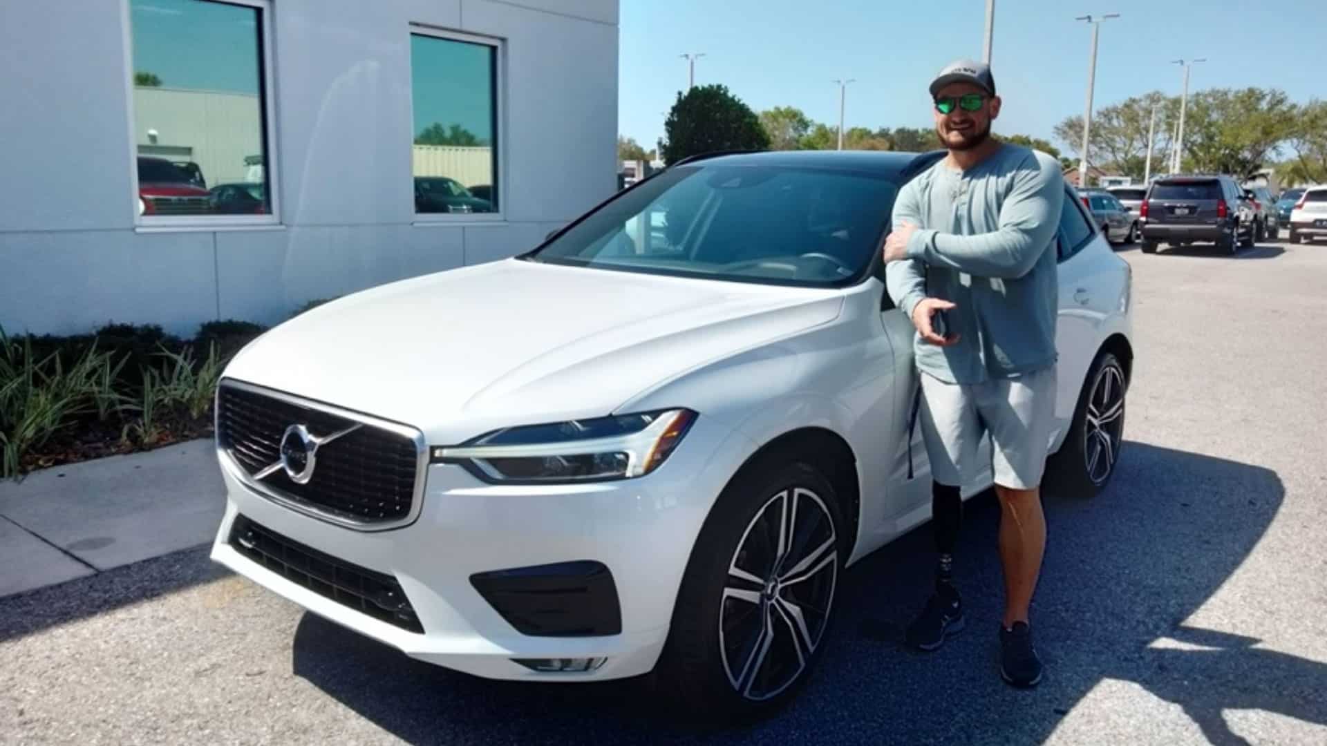 U.S. Army Specialist Stephen Peterson with 2023 Volvo XC60 Sport Utility.